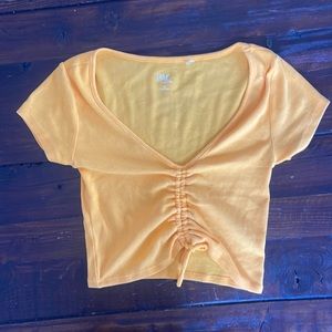 Gold ribbed cap sleeve crop top. Size XS.